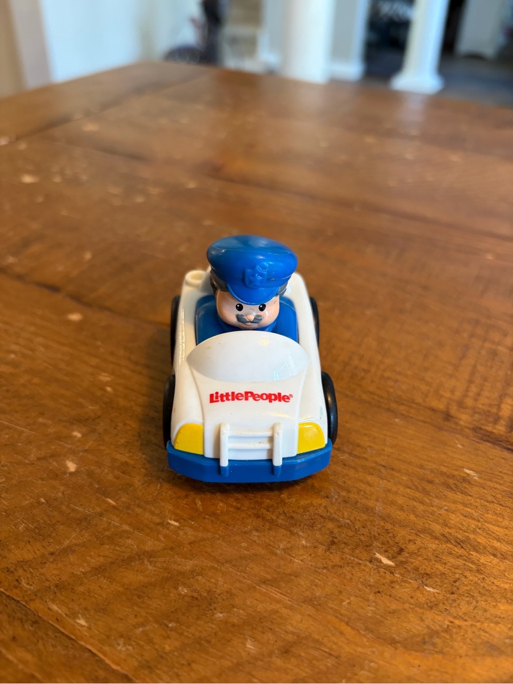 Fisher Price Little People police car wheelie as is
